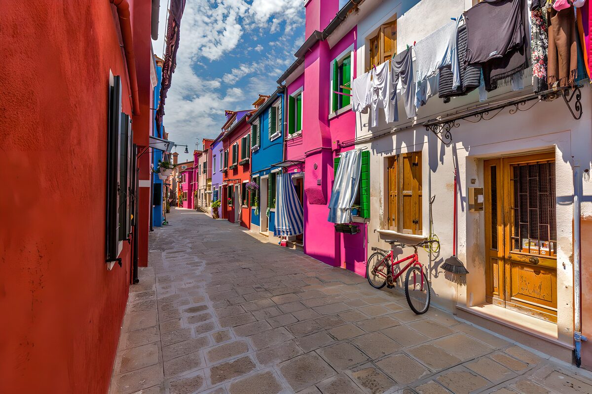 Colourful houses on a sunlit lane