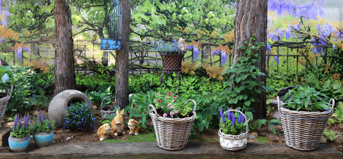 Flower baskets in a leafy spring garden