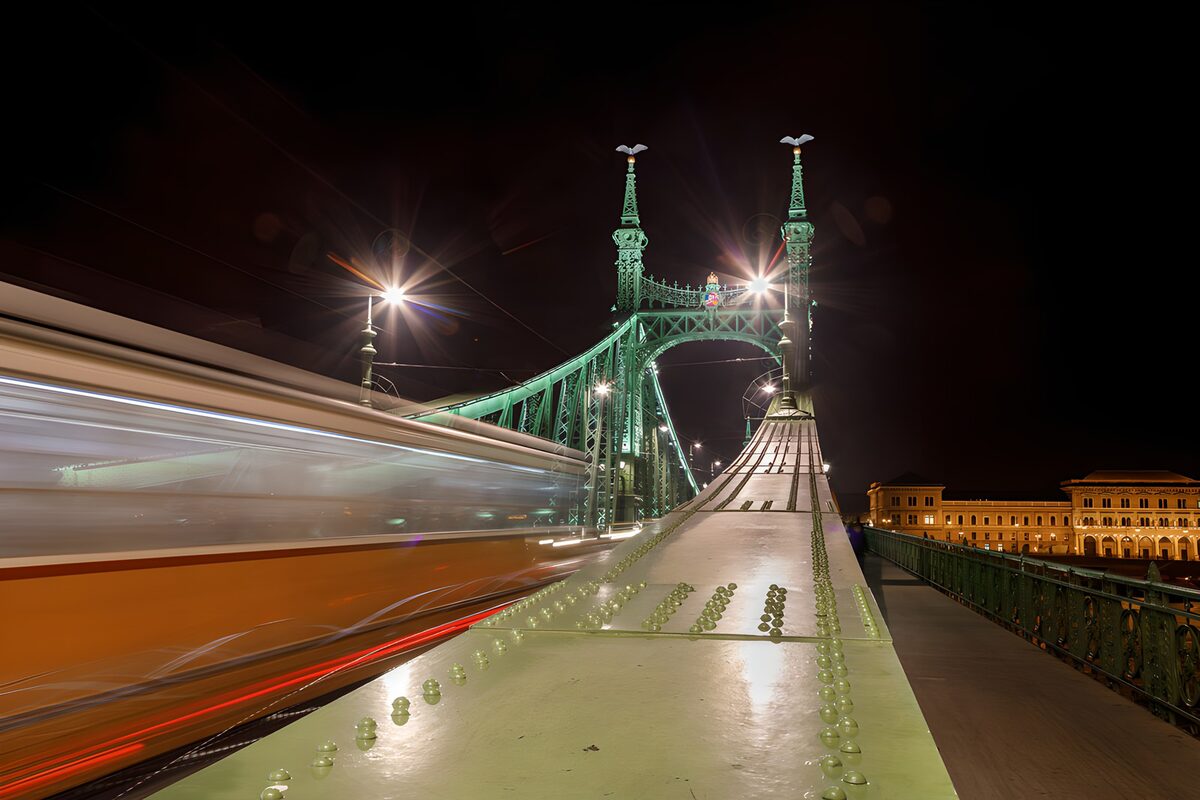 Liberty Bridge and a tram after dark