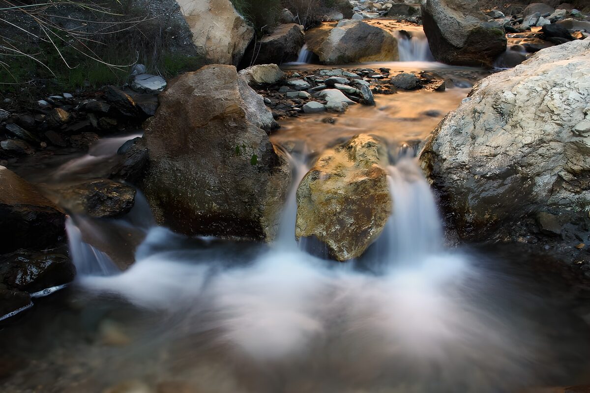 Rocky cascades in warm light