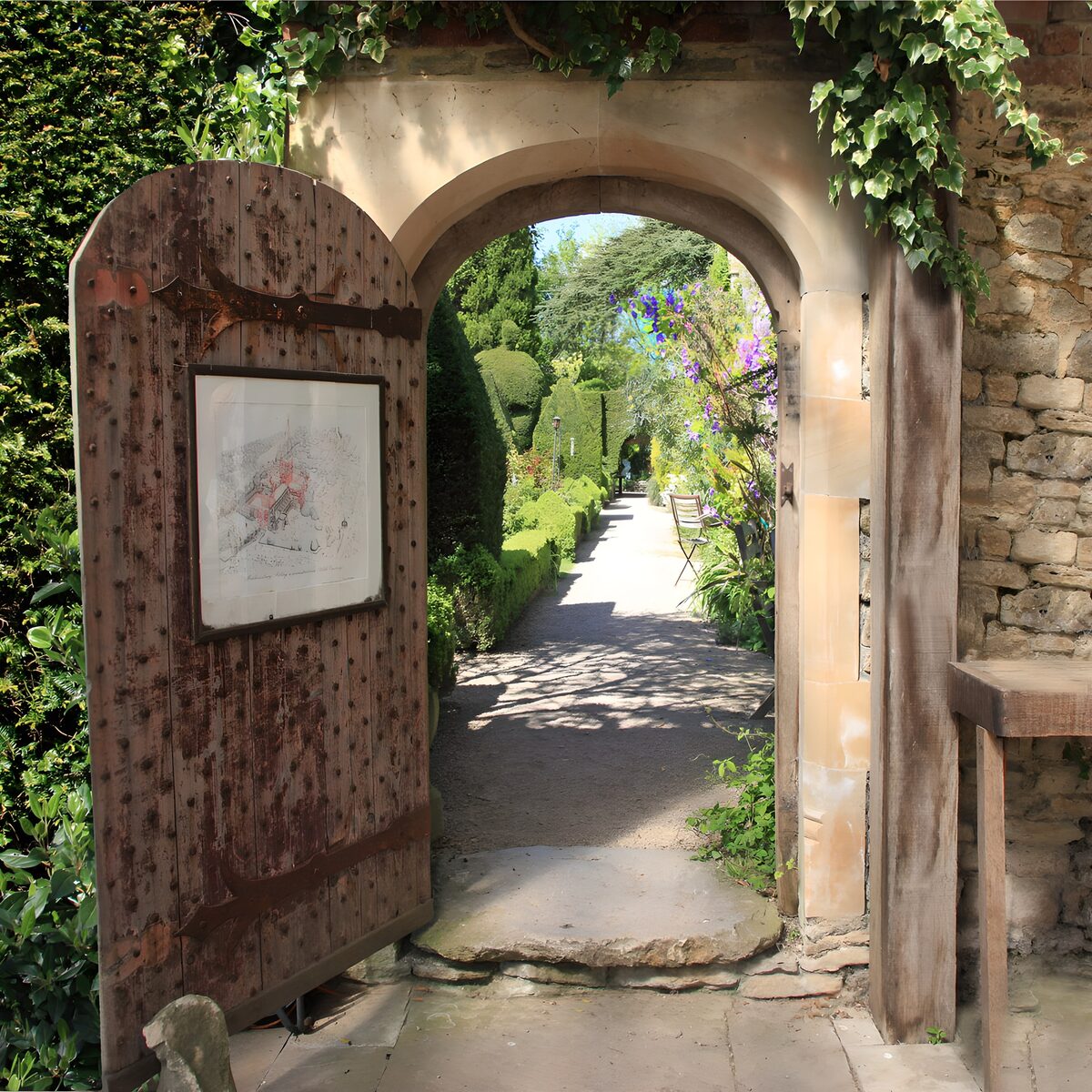 Through the arch, summer waits