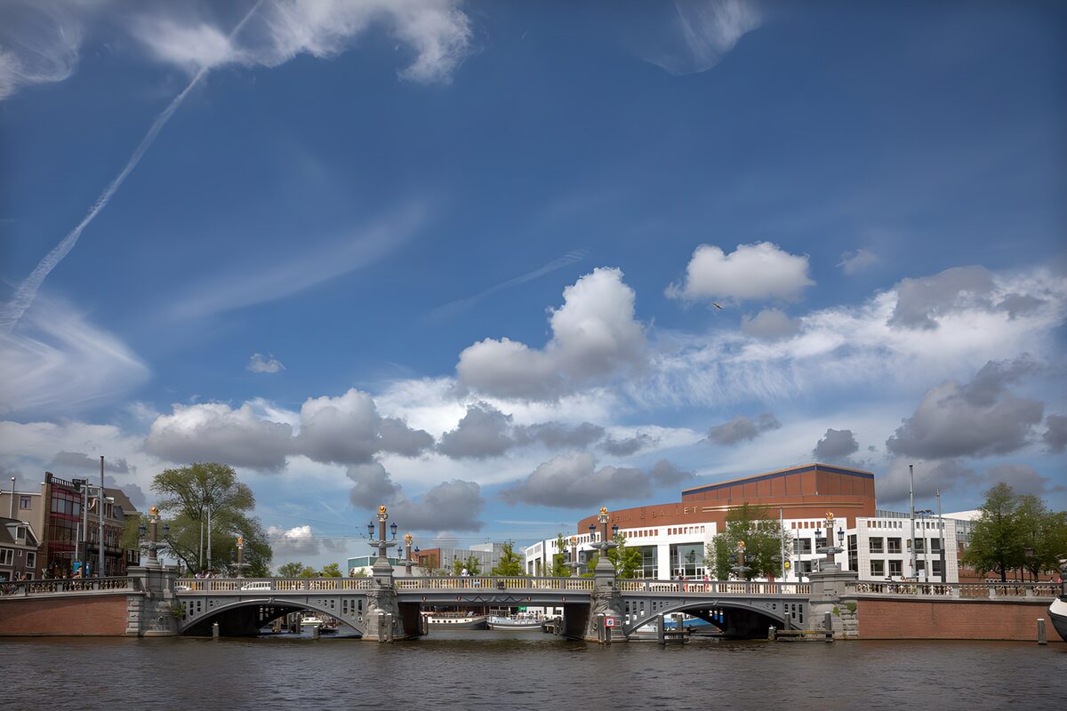 Ornate bridge beneath a wide blue sky