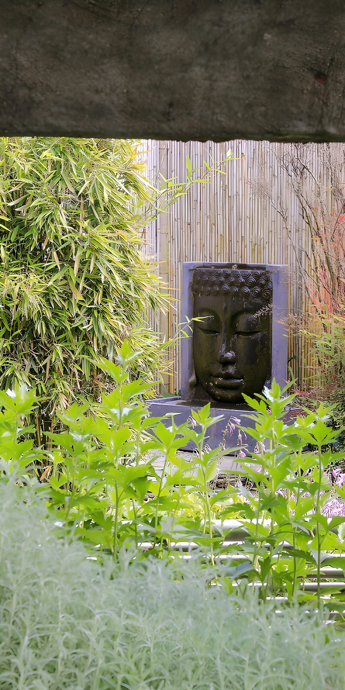Buddha fountain in a quiet garden