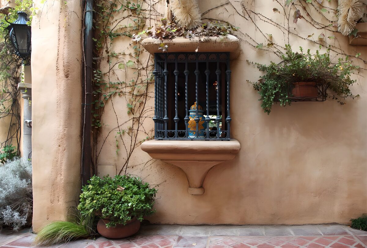 Rustic window with a leafy fringe