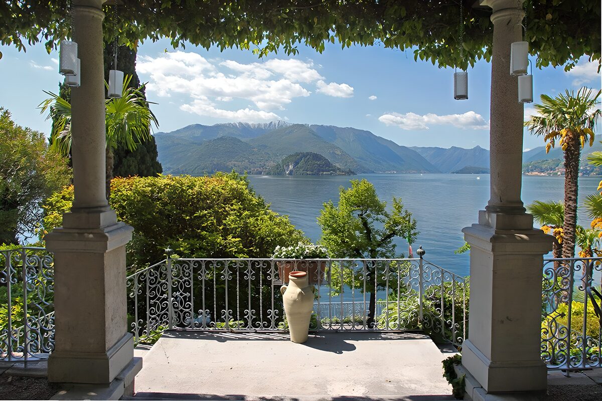 Shaded terrace above a blue mountain lake