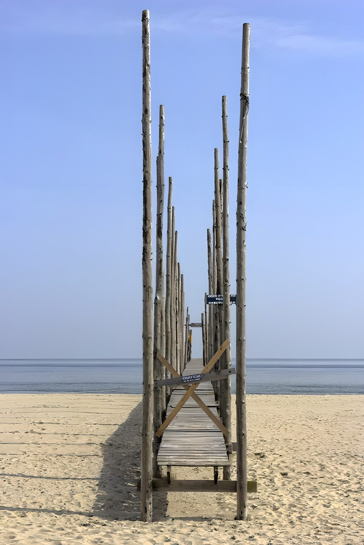 Wooden jetty on a quiet beach